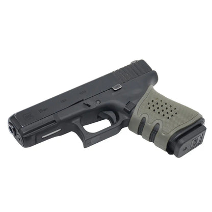 Universal rubber grip for handguns